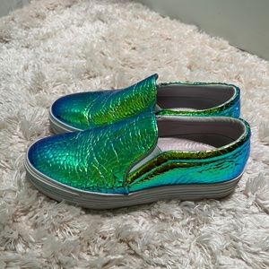 Joshua Sanders patent reptile iridescent